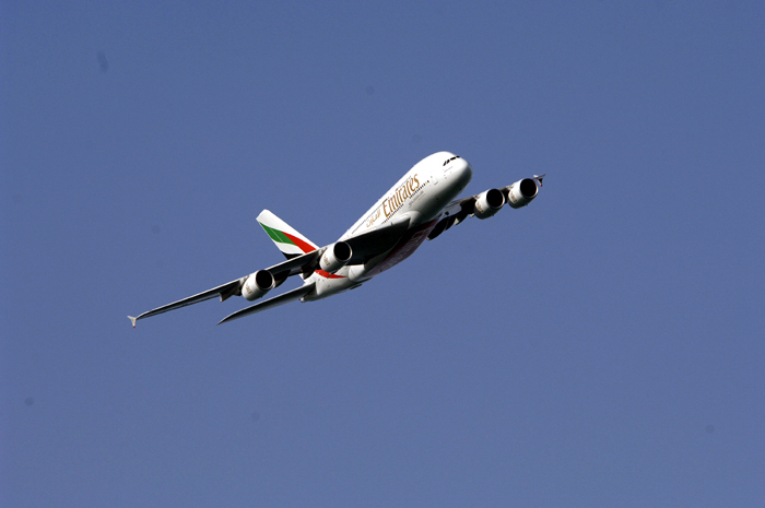 Airbus A380 over Jumeirah Beach in Dubai